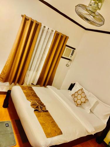 Ένα ή περισσότερα κρεβάτια σε δωμάτιο στο Sophias Beach Guest House