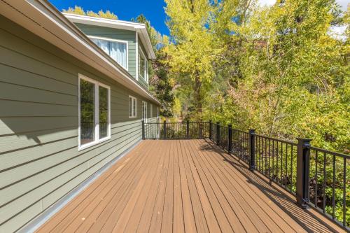 a wooden deck on the side of a house at 177 Blue Tip Drive in Ridgway
