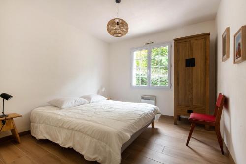 Posteľ alebo postele v izbe v ubytovaní Belle maison proche de la mer pour 6 personnes