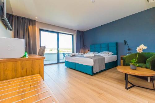 Postel nebo postele na pokoji v ubytování Hotel Delfin Lanterna
