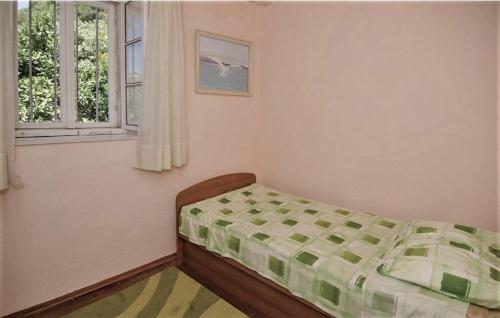 Postel nebo postele na pokoji v ubytování Kuća za odmor Matić