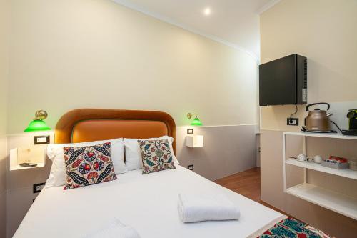 Letto o letti in una camera di Habitat Monti