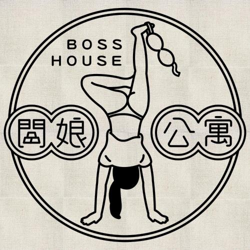 a person doing a cross yoga pose in front of a house at 闆娘公寓 in Kaohsiung