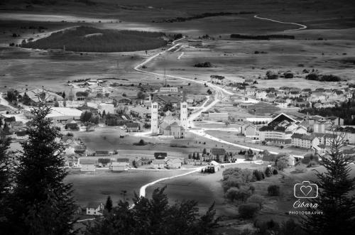 a black and white photo of a small town at Holiday home Maša - Kupres in Kupres