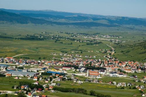 an aerial view of a town in a field at Holiday home Maša - Kupres in Kupres