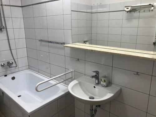 Kúpeľňa v ubytovaní Apartamenty JN Poznań Rzeczna 4