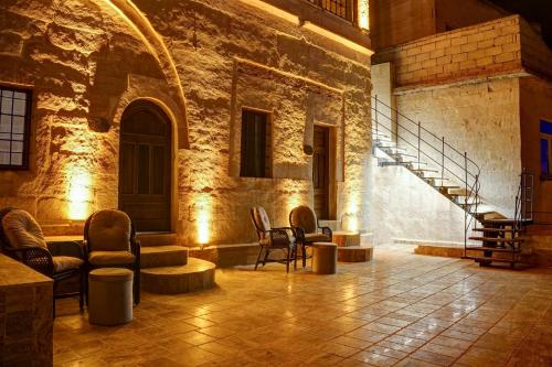 Ruang duduk di Dionysos Cave Cappadocia Hotel