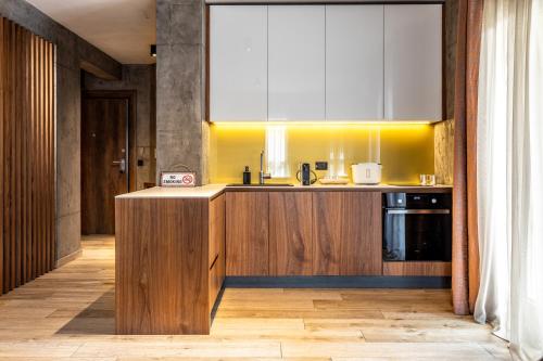 a kitchen with a sink and a counter top at Bella Roe Premium Apartments in Belgrade