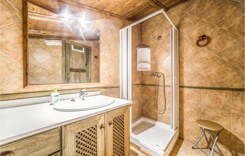 a bathroom with a sink and a shower at Beautiful Home In Les Coves De Vinrom With Private Swimming Pool, Can Be Inside Or Outside in Les Coves de Vinroma