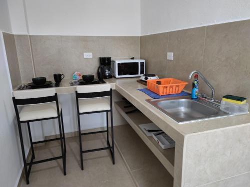 Kuchyň nebo kuchyňský kout v ubytování Casa en Mahahual cerca de la playa D3