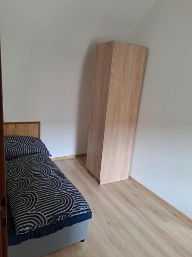 Posteľ alebo postele v izbe v ubytovaní Ubytovanie v centre Hliníka nad Hronom