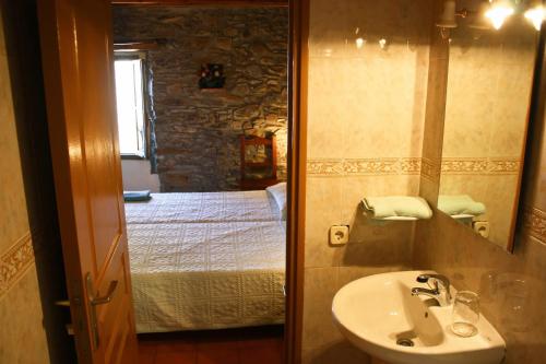 Ett badrum på Hostal Rusó SC
