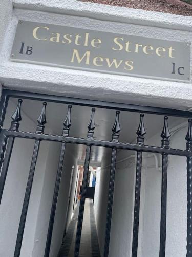 a sign that reads castle street movies on a building at Castle St Mews of Southport - 2 bed townhouse in Southport