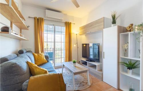 Televízia a/alebo spoločenská miestnosť v ubytovaní Lovely Apartment In Malaga With Wifi