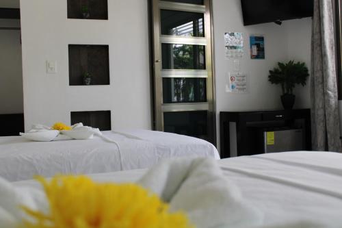 Ένα ή περισσότερα κρεβάτια σε δωμάτιο στο Casa Zazil