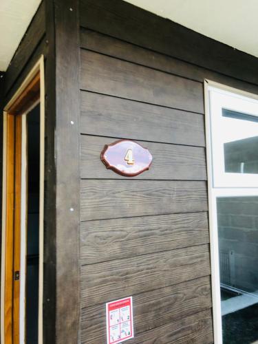 a garage door with a sign on it at Cabañas Carrera in Punta Arenas
