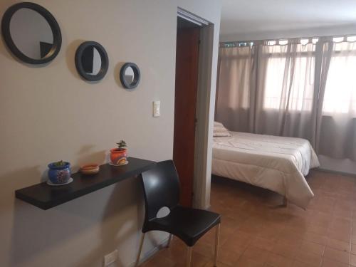 Katil atau katil-katil dalam bilik di El Racimo, dpto en Ciudad de Mendoza