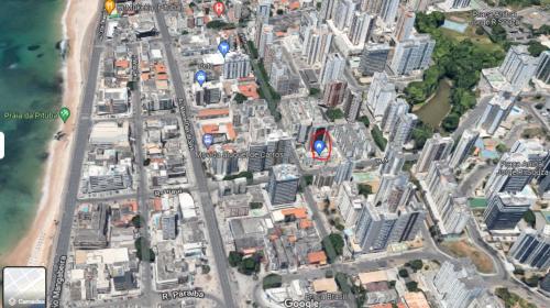 a map of a city with a beach and buildings at Apartamento Oxe! Tô na Bahia in Salvador