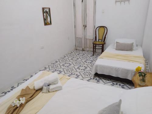 Postel nebo postele na pokoji v ubytování Casa Ego