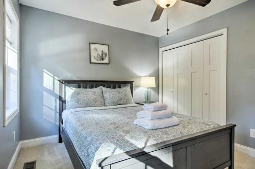 a bedroom with a bed and a ceiling fan at Idyllic Pinehurst Home, Near Golf Course! in Pinehurst