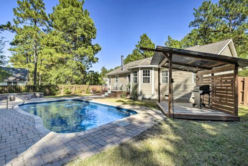a house with a swimming pool in the yard at Idyllic Pinehurst Home, Near Golf Course! in Pinehurst