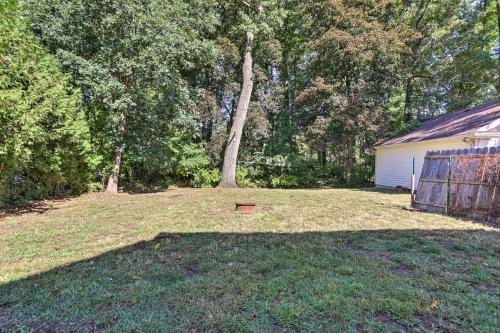 a yard with a tree and a garage at 5 Mi to UT Quiet Toledo Duplex Near Parks! in Toledo