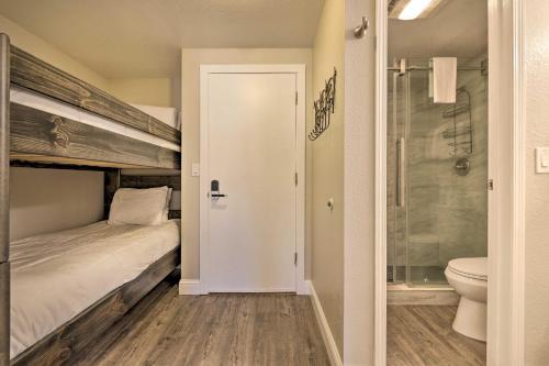 a bedroom with a bunk bed next to a toilet at Cozy Studio with Balcony, Walk to Brian Head Resort! in Brian Head