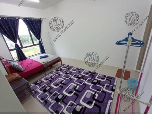 a bedroom with a purple bed and a window at Nana Homestay Malay Only in Kampong Chepor