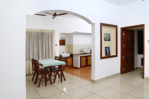 Kuchyň nebo kuchyňský kout v ubytování kevins Placid Homestay