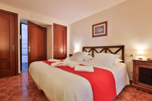 Postel nebo postele na pokoji v ubytování Hôtel Playa