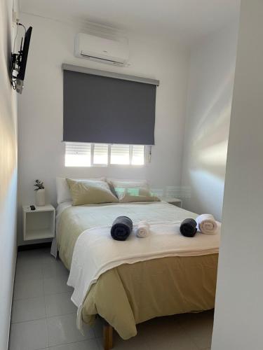 Ein Bett oder Betten in einem Zimmer der Unterkunft Pensión Coripe