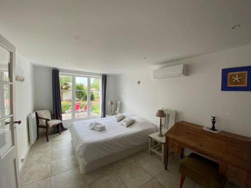 Giường trong phòng chung tại Jolie maison réthaise *** - Grand jardin privatif