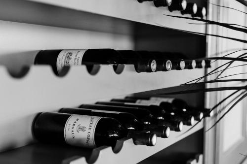 a bunch of wine bottles sitting on a wine rack at Hotel Restaurant Belvédère in Schoonhoven