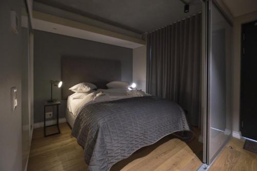 Cama o camas de una habitación en Urban Elephant. The Docklands