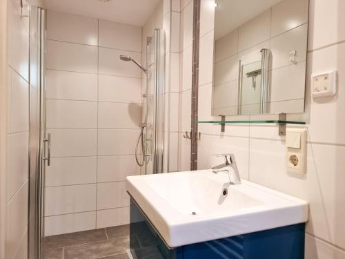 Ένα μπάνιο στο Rustig gelegen Vakantiehuis AK10