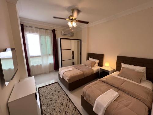 Ένα ή περισσότερα κρεβάτια σε δωμάτιο στο Modern apartment