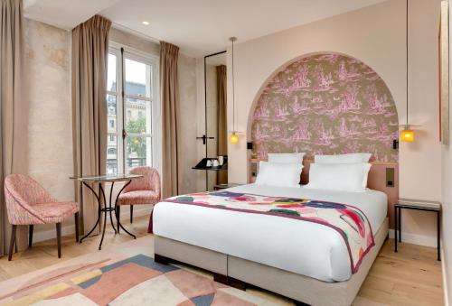 Cama o camas de una habitación en Les Rives de Notre-Dame