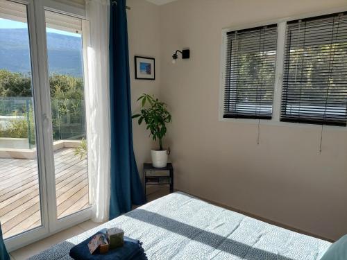 Ένα ή περισσότερα κρεβάτια σε δωμάτιο στο Magnifique suite familiale