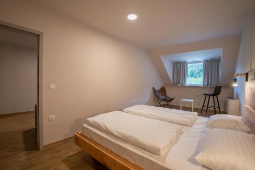 Postel nebo postele na pokoji v ubytování Hotel Arena Maribor