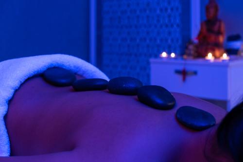 a purple cake with blue stones on top of it at Spa Hotel Colossae Thermal in Pamukkale