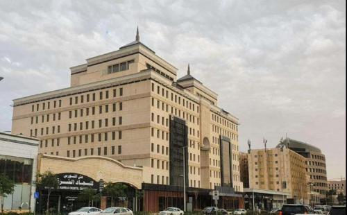 a large building with two towers on top of it at Joudyan Olaya Riyadh in Riyadh