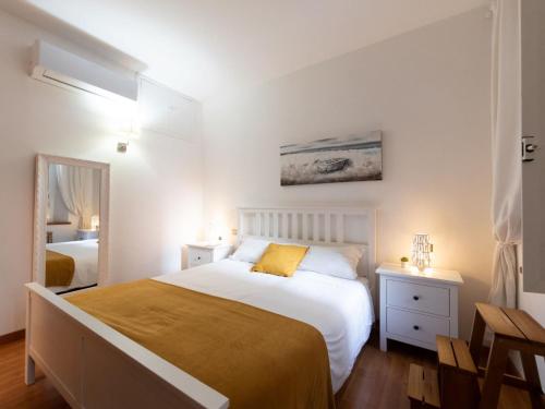 Postel nebo postele na pokoji v ubytování The Best Rent - Stylish one-bedroom apartment in Piazza Barberini