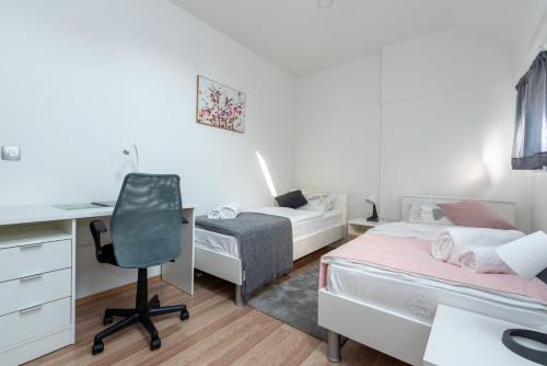 Posteľ alebo postele v izbe v ubytovaní Apartman Lega - Daruvar