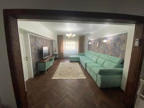Zona d'estar a Violetta Apartament