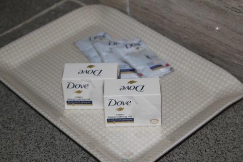 a table with three packs of diapers on it at HOTEL BODHGAYA INN in Bodh Gaya