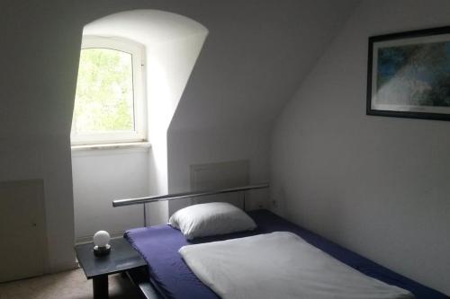 Krevet ili kreveti u jedinici u okviru objekta Zentrale gemütliche Wohnung