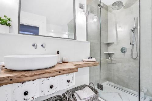 a bathroom with a sink and a shower at Pinnacle Port Penthouse 10 in Panama City