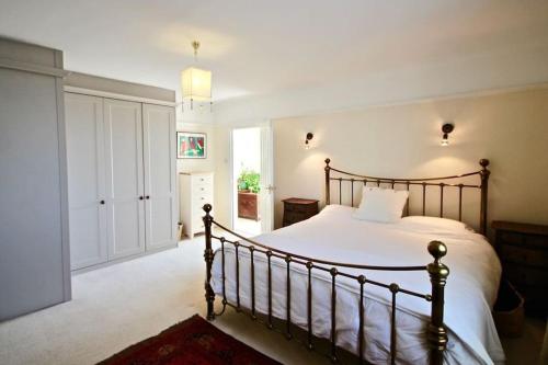 a bedroom with a large bed in a room at Albion House in Deal