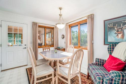 a dining room with a table and chairs at Hidden Gem in Arcadia