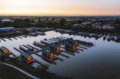 an aerial view of a marina at sunset at Kingfisher in Tattenhall
